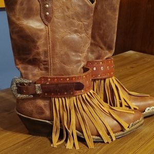 Leather fringe boot straps.
